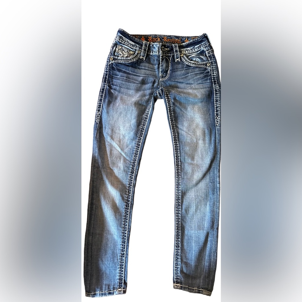 Rock Revival Blue Denim Jeans with White Logo Patch and Silver Accents
